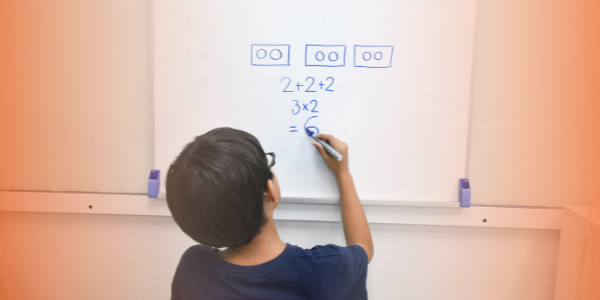 Child solving Maths