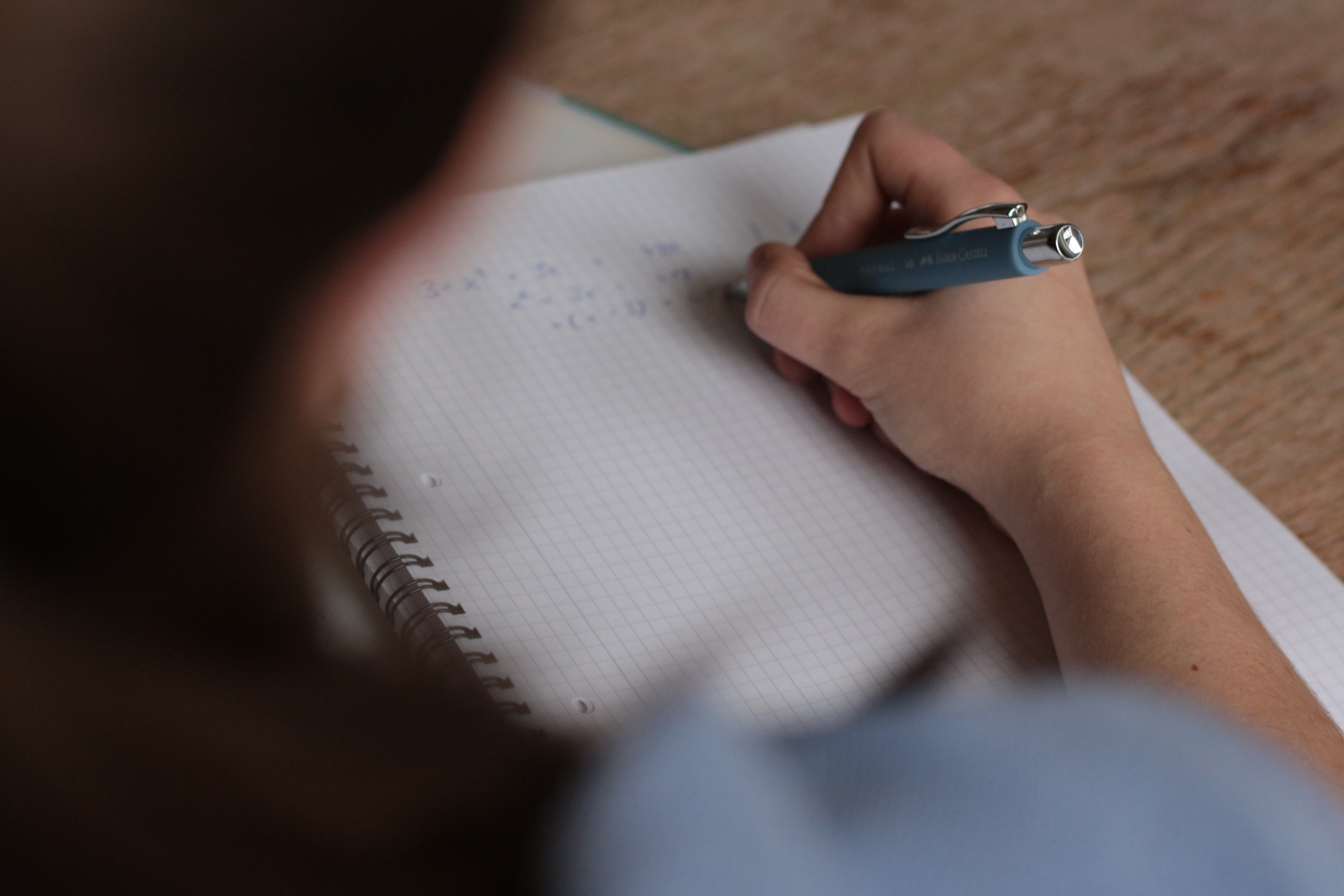 A child writing exams