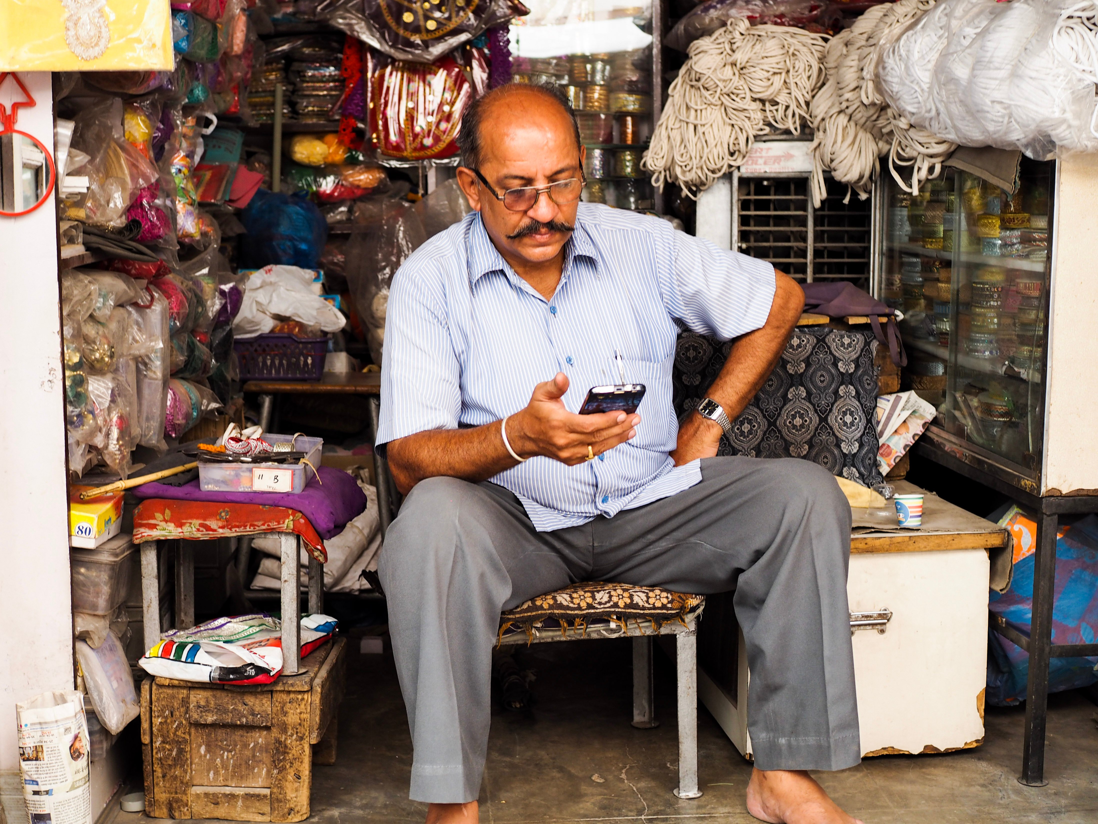 man looking at his phone